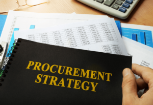 A procurement strategy plan being implemented alongside processes that analyse financial data to elevate a business using strategic sourcing. 